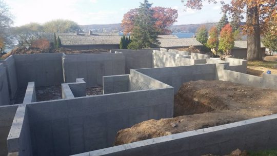 Foundation walls in place for a new home and ready for backfill